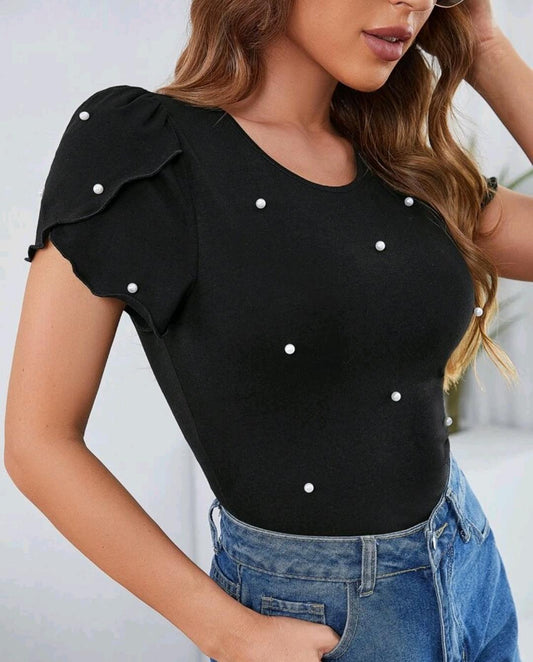 Blusa con perlas